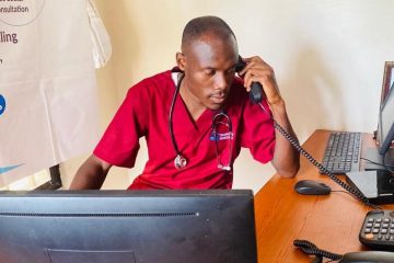 A Teamwork Homecare Services Medic (in red shirt) follows up on a patient's progress through calling to ensure they are getting the best treatment options available